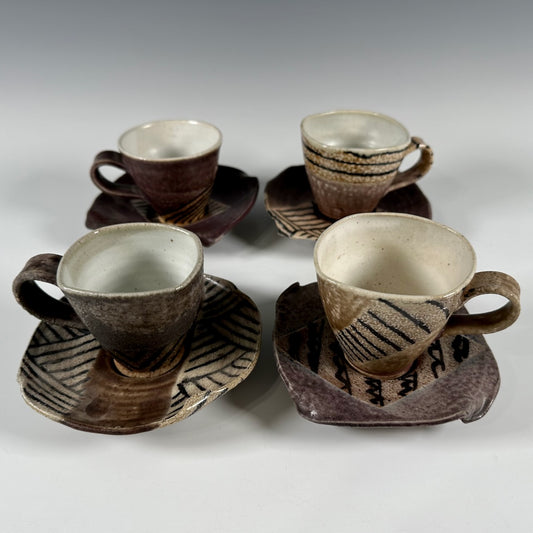 Paul Morse cups and saucers, set of four